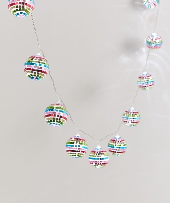 rainbow colored hanging disco ball string lights