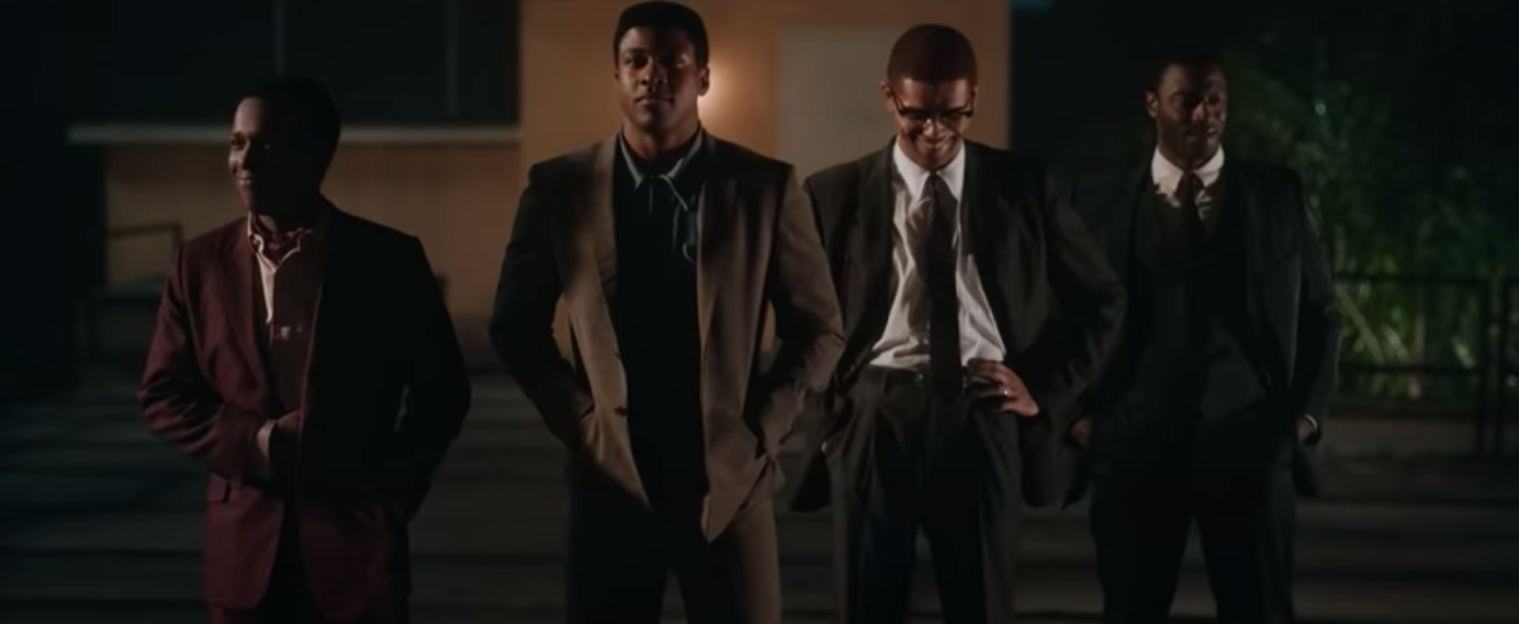 A screenshot of Aldis Hodge, Leslie Odom Jr., Eli Goree, and Kingsley Ben-Adir in character for "One Night In Miami"