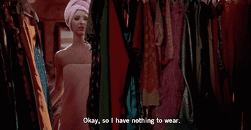 &quot;Okay, so I have nothing to wear&quot; in front of a closet of clothes