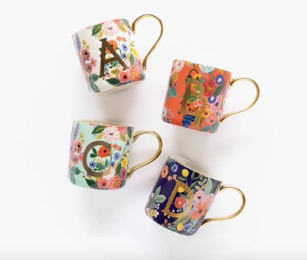 the mugs in different floral designs 