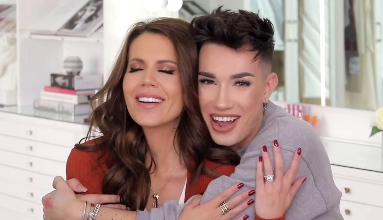 Tati Westbrook and James Charles hugging. 