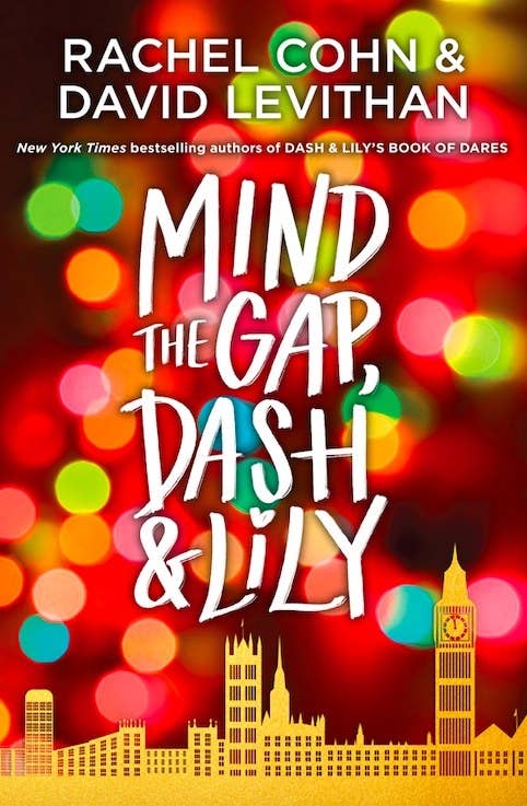 &quot;Mind the Gap, Dash &amp;amp; Lily&quot; by Rachel Cohn &amp;amp; David Levithan book cover; featuring Christmas lights in the background and a London skyline silhouette 