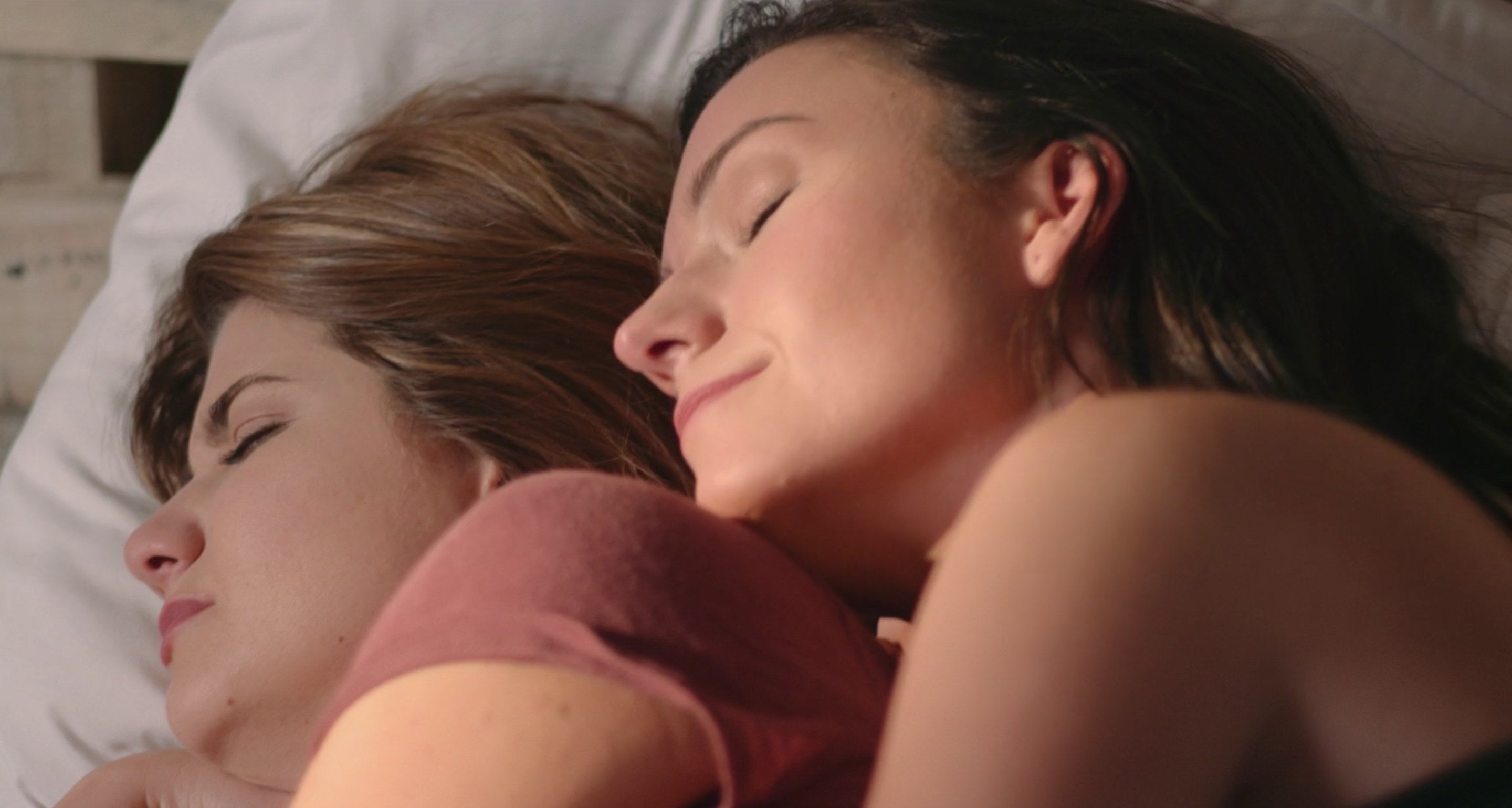 Two women snuggling