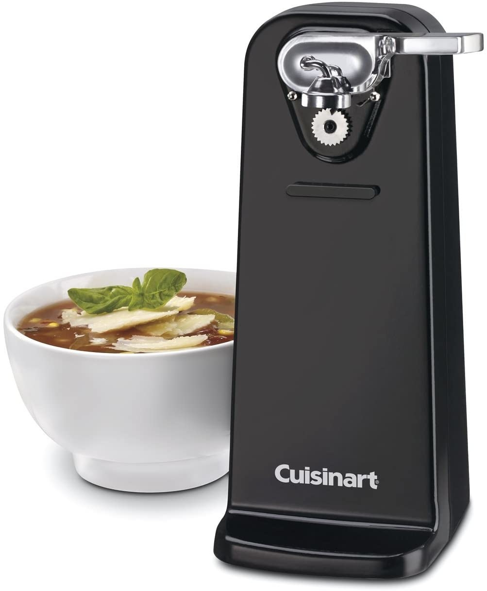 The electric can opener next to a bowl of soup