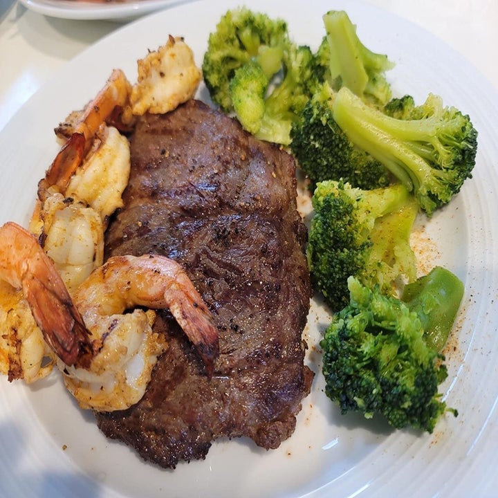 Cooked steak and shrimp fresh off the indoor grill