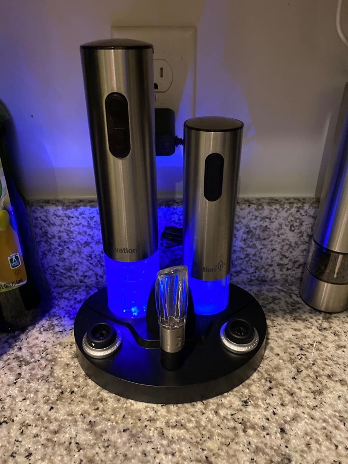 Reviewer image of the Ivation wine gift set on a kitchen counter, plugged in