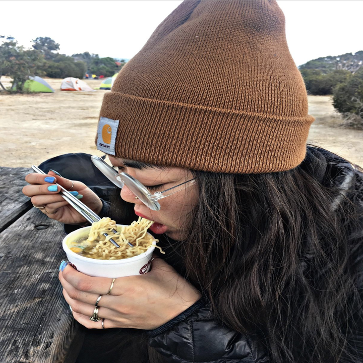 Reviewer in brown/beige color of hat 
