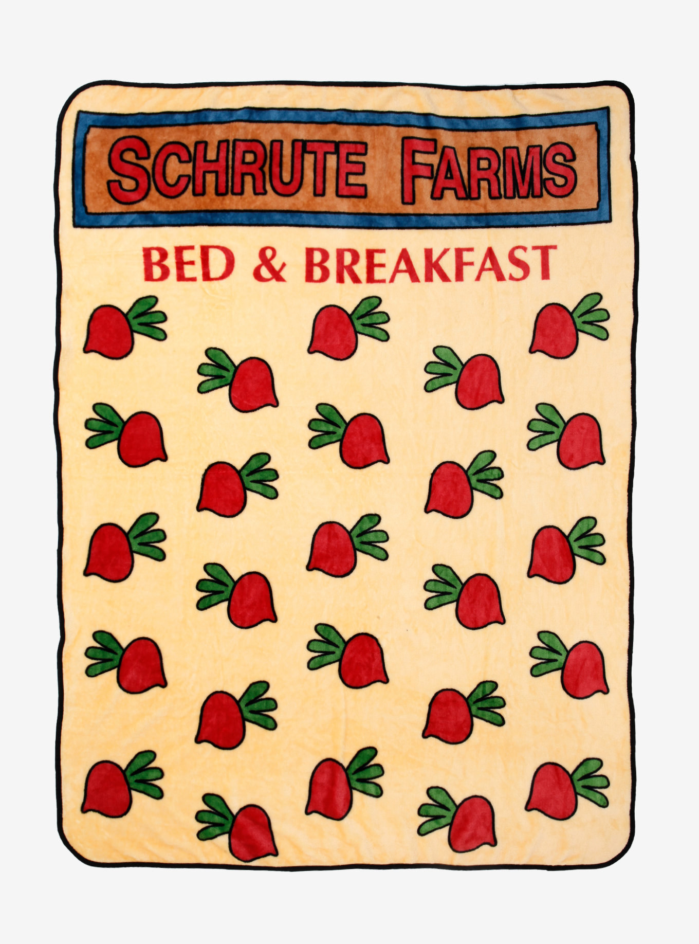 the blanket with radish illustrations and text saying "Schrute Farms Bed and Breakfast"
