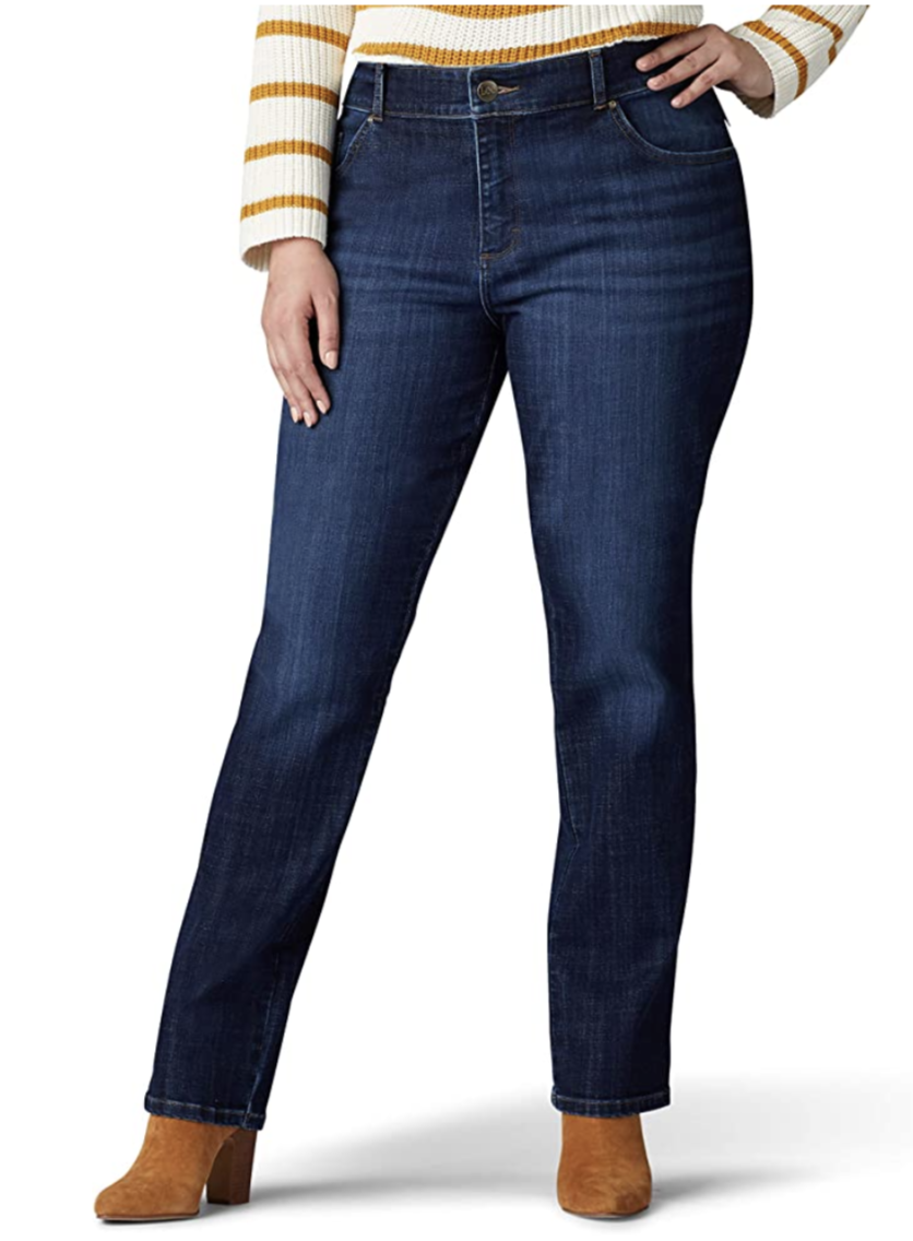 model in a pair of dark wash straight leg midrise jeans 