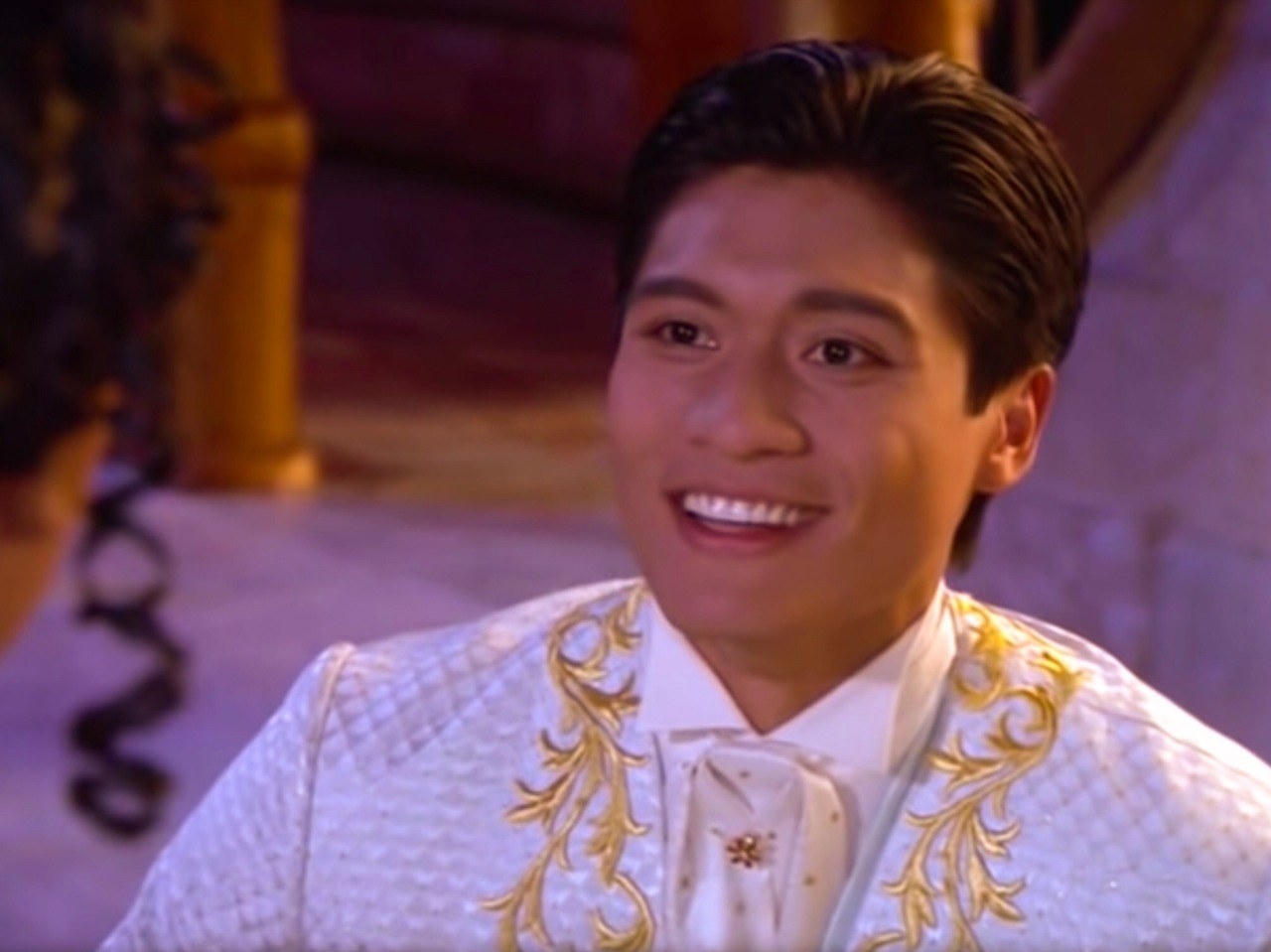 Paolo Montalbán as the Prince smiling up at Cinderella at the ball
