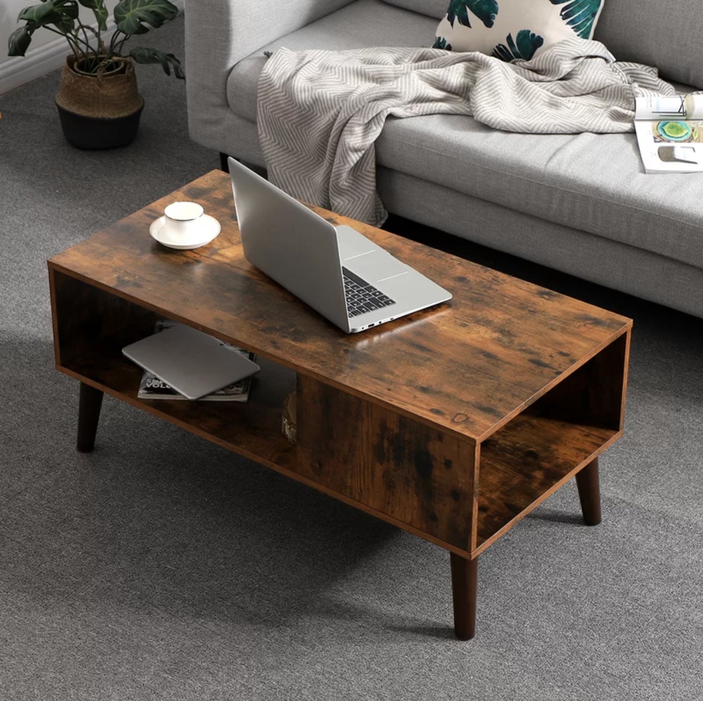 The coffee table with storage in rustic brown