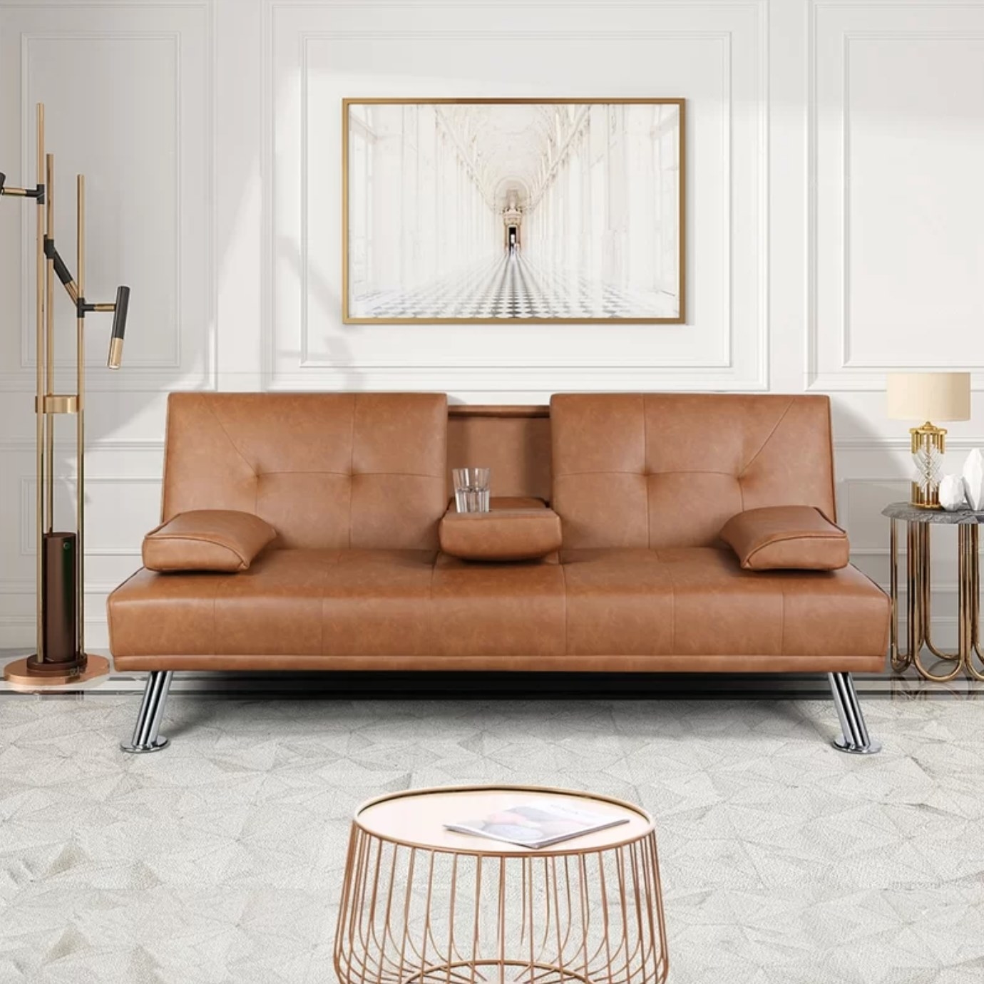 The convertible sofa in brown faux leather