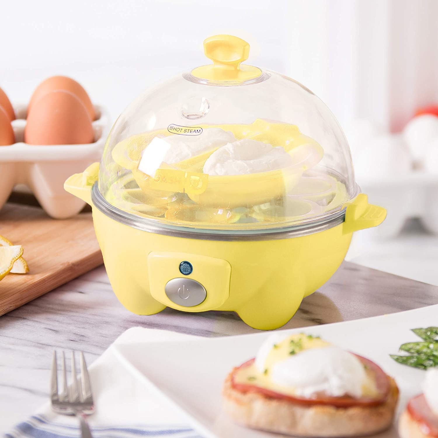 The egg cooker with poached eggs inside of it