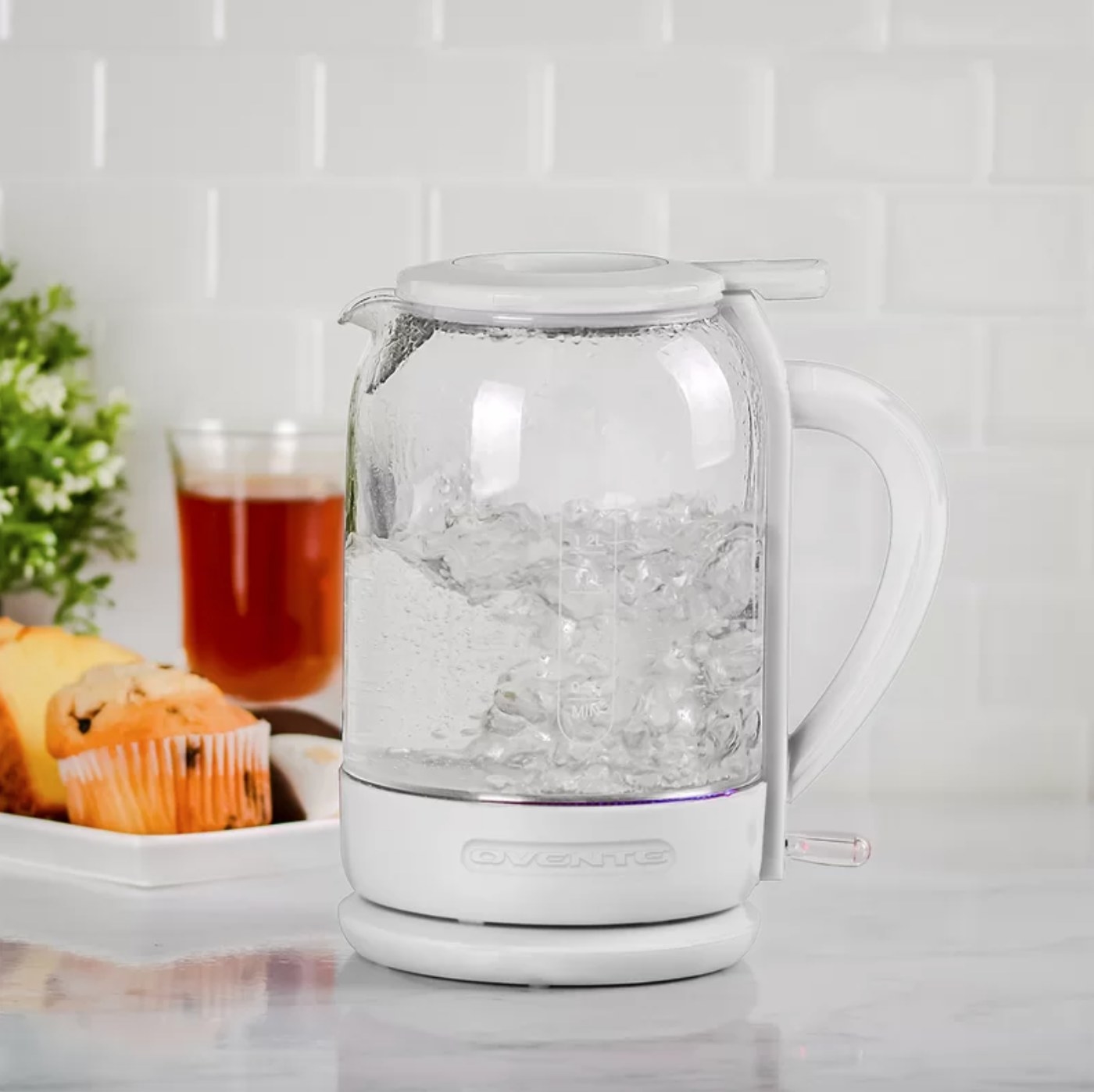 The electric glass tea kettle in white