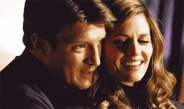 Castle holds Beckett from behind, and then she turns