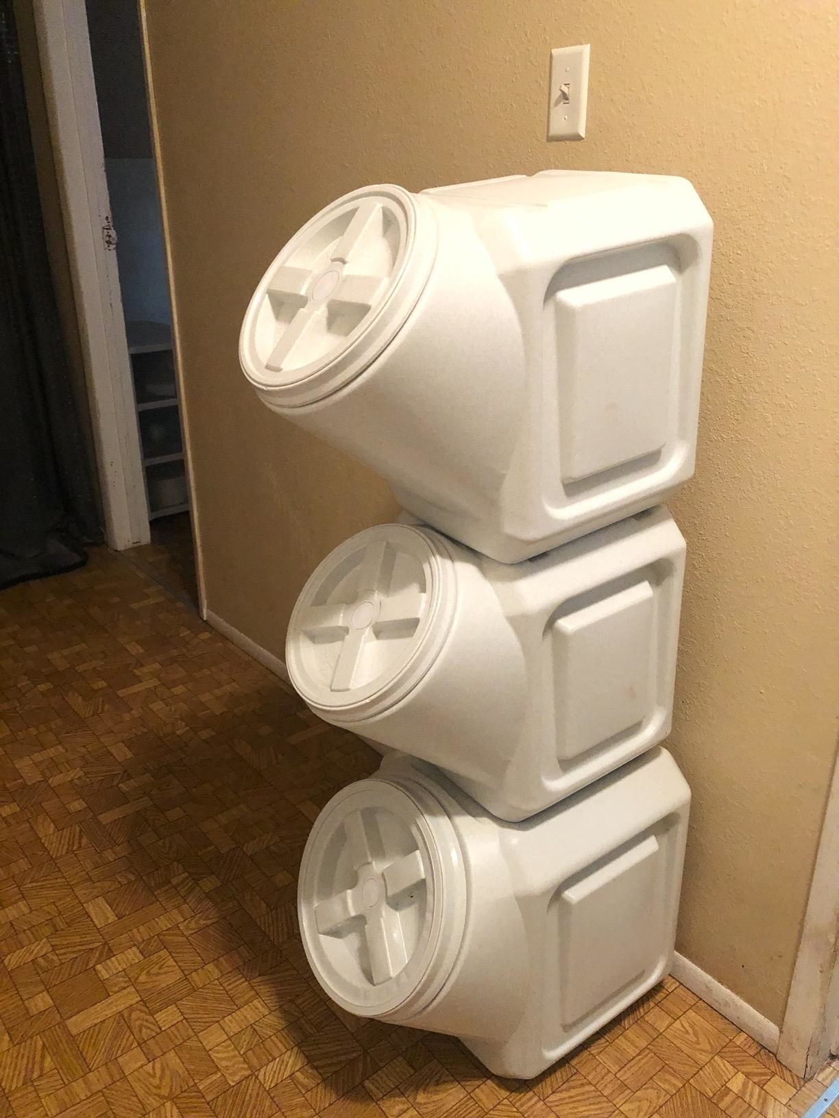 Reviewer&#x27;s photo showing three white stacked airtight containers