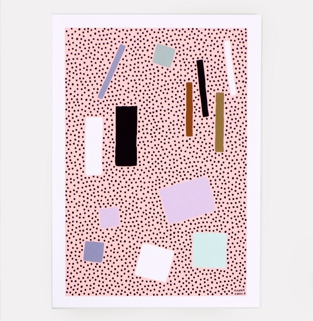 The pink print, which features different color shapes on a polka dot background