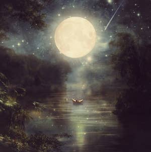 the full moon over a boat in a lake print 