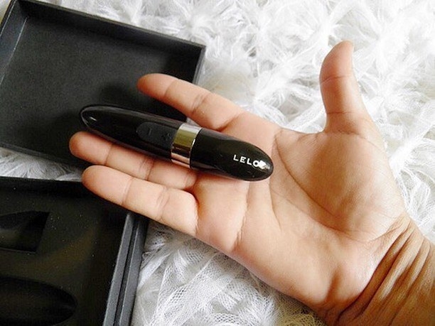 The vibrator resting on someone&#x27;s open hand