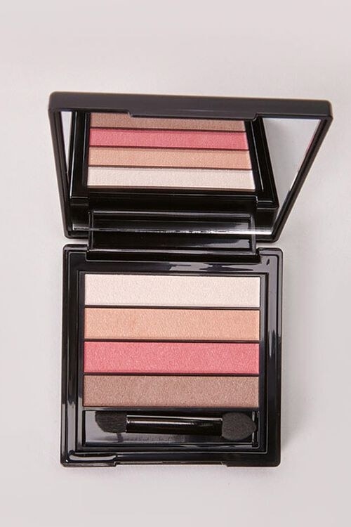 The palette with light, pink, nude, and brown shades. The palette has a mirror and an eyeshadow sponge