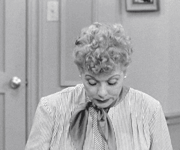 Lucille Ball as Lucy on &quot;I Love Lucy&quot; looking guilty.