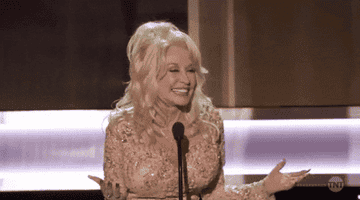 Dolly Parton gives a wholesome laugh on stage during the 2017 SAG awards