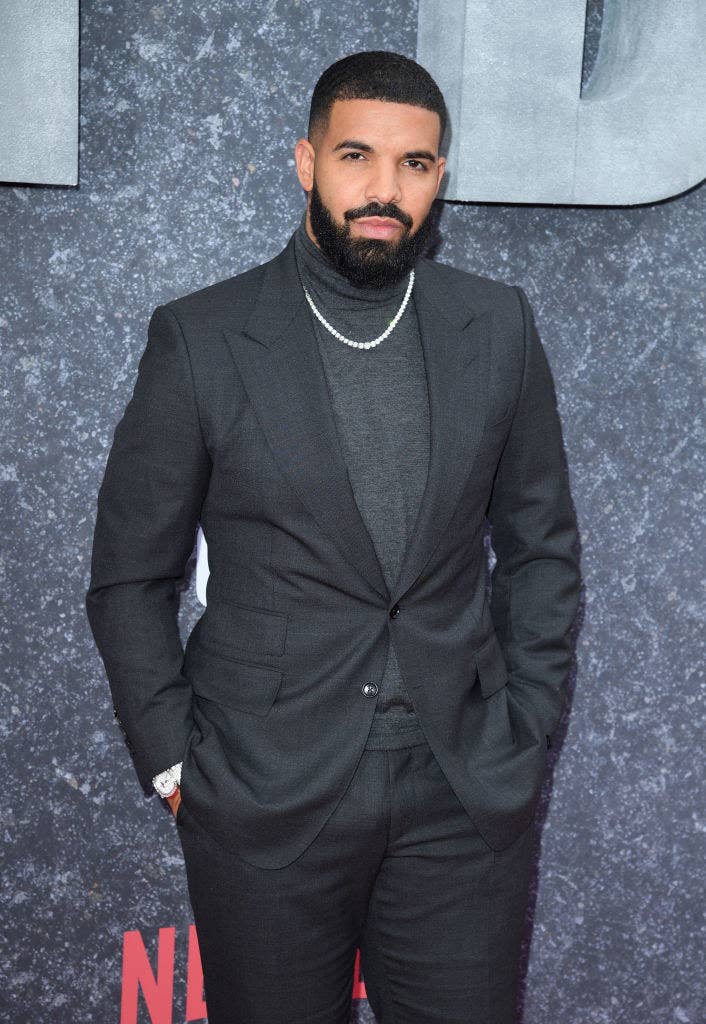 Drake posing on a red carpet at the &quot;Top Boy&quot; premiere in 2019