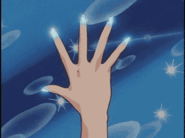 Gif of Sailor Moon character&#x27;s nails shining bright blue