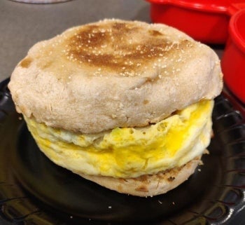 The same reviewer's omelet now sandwiched perfectly between an English Muffin