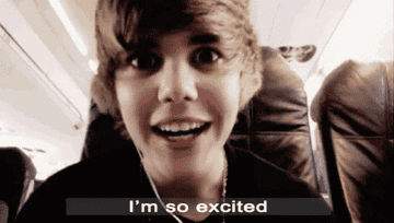 A young Justin Bieber excited on an airplane 