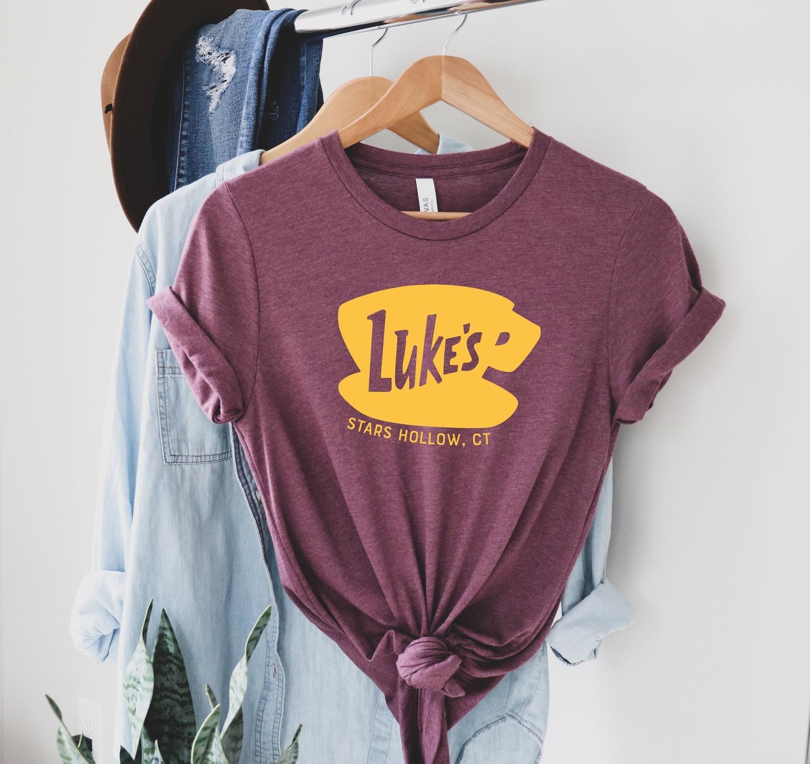 the maroon shirt with a Luke&#x27;s Diner logo 