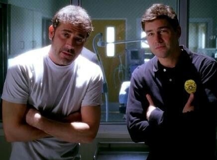 Dylan and Denny standing in front of Meredith on Grey's Anatomy