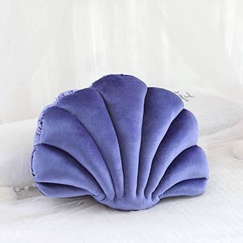 the purple version of the seashell pillow