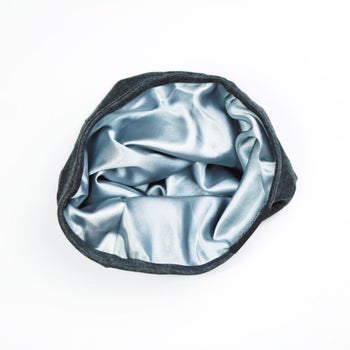 The inside of the satin cap
