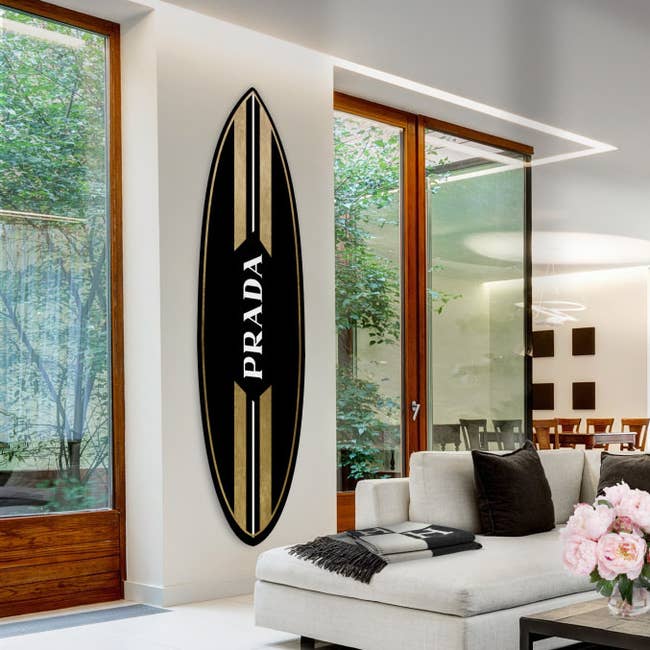 gold and black surfboard wall art with 