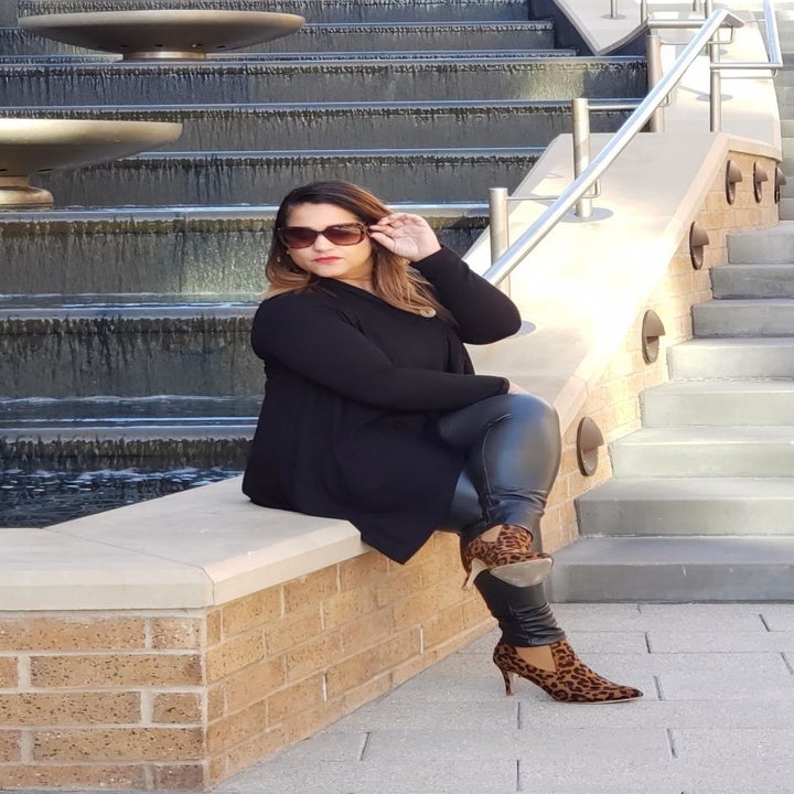 Reviewer wearing the leopard print booties