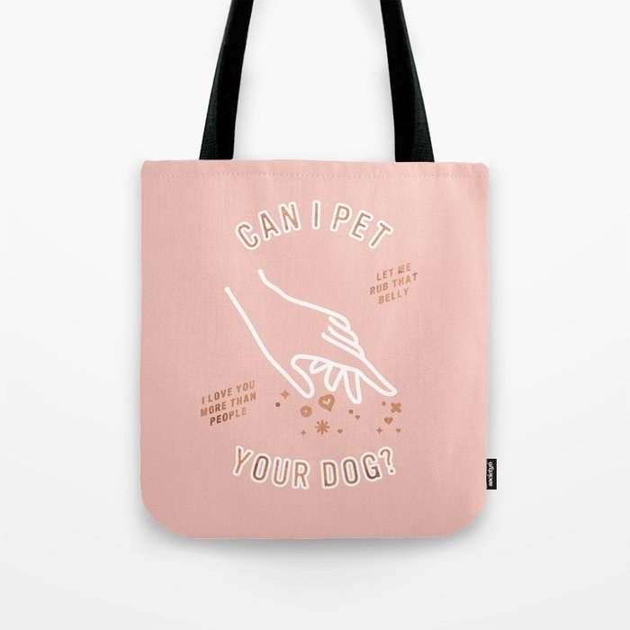 A pink tote with the graphic of a hand and the text &quot;Can I pet your dog?&quot;