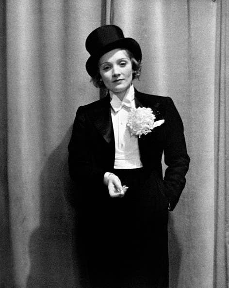 Marlene Dietrich in a suit and top hat