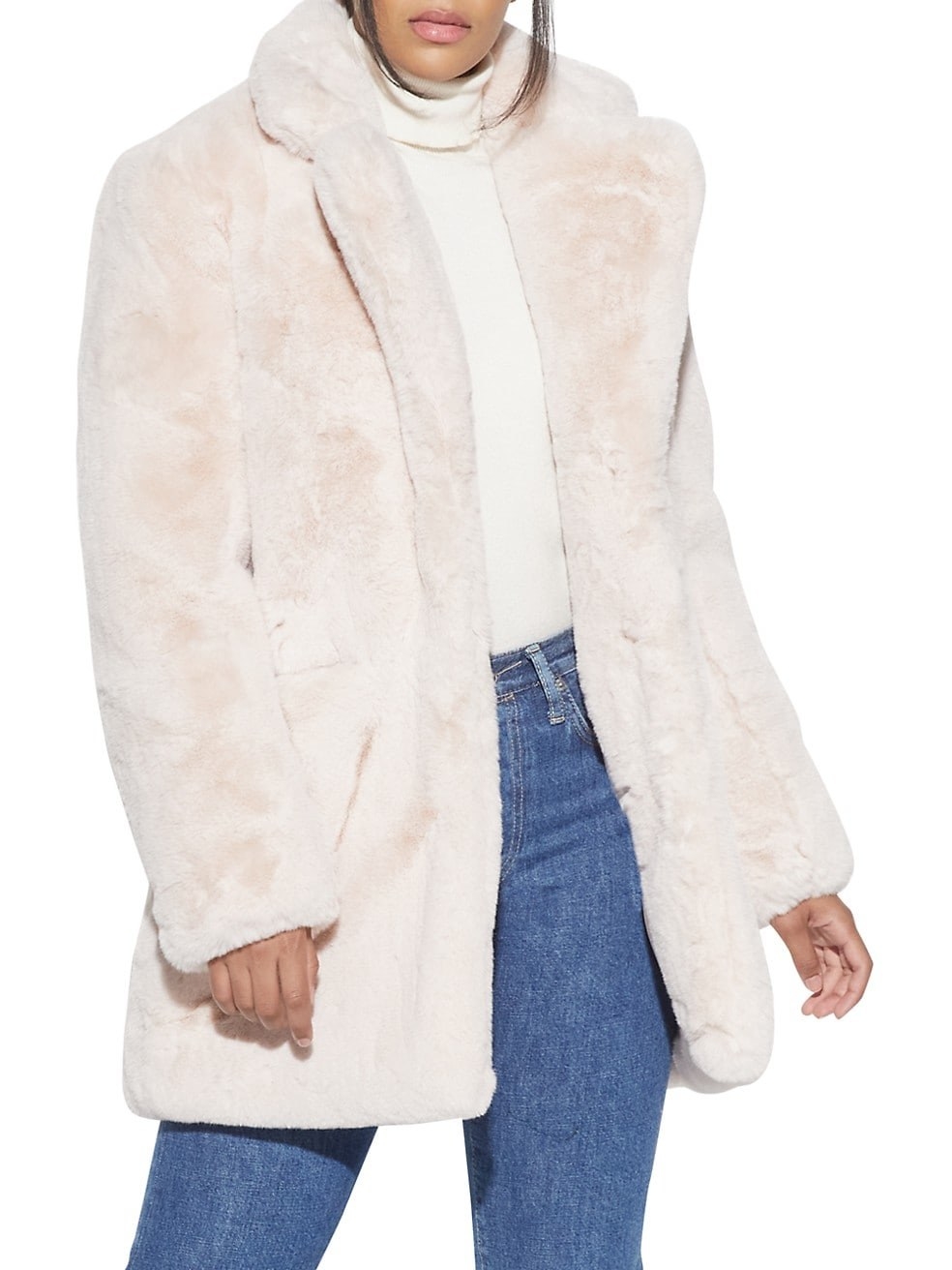 Model in the coat, which goes just past their hips
