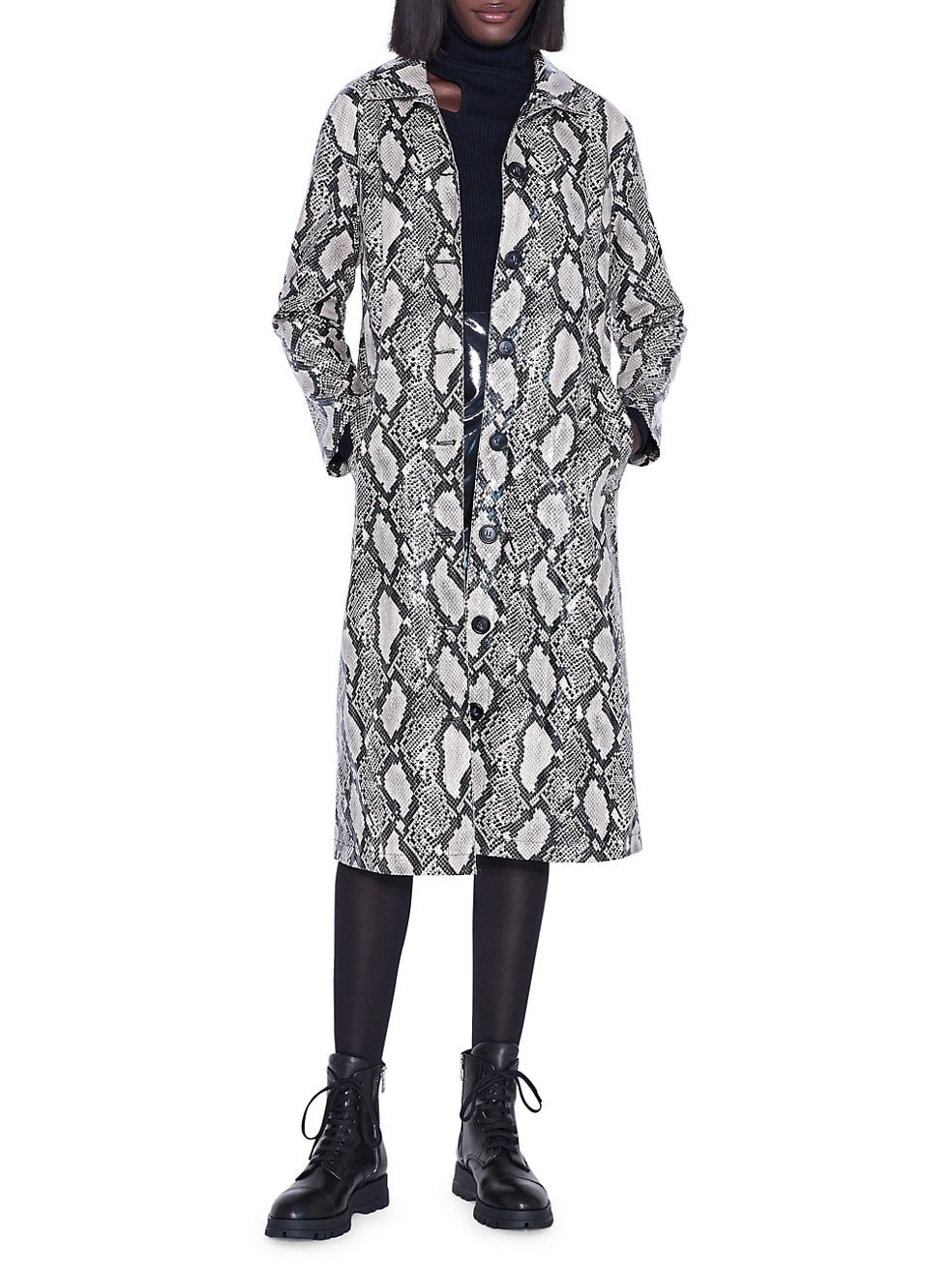 Model in the grey and white snake print knee-length coat