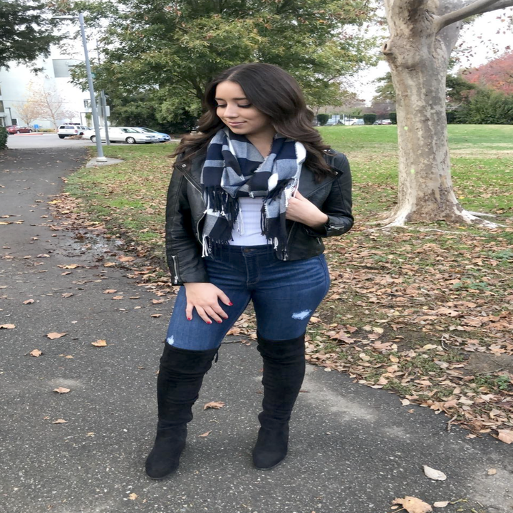 reviewer wearing the black pair