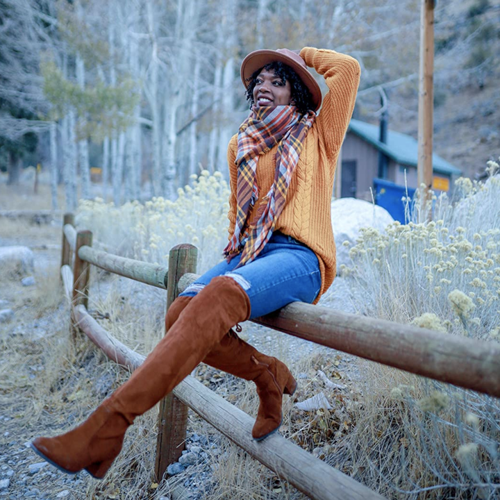 different reviewer wearing the brown camel color