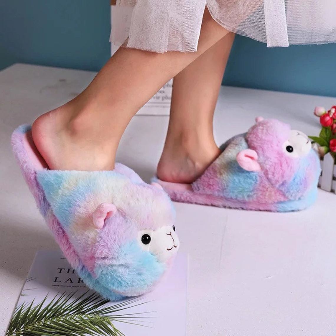 Fluffy slippers shaped like a rainbow alpaca