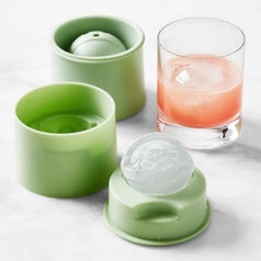 green mold that creates ice shaped like baby yoda in pram