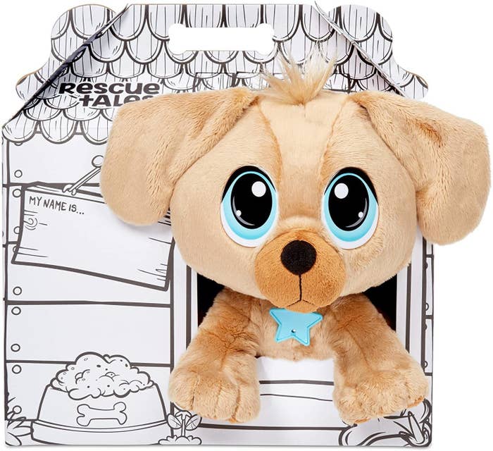 the golden retriever toy in a dog house