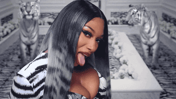Megan winking with tongue out