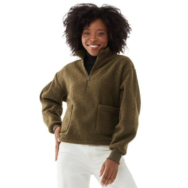 Model in half zip faux sherpa sweatshirt 