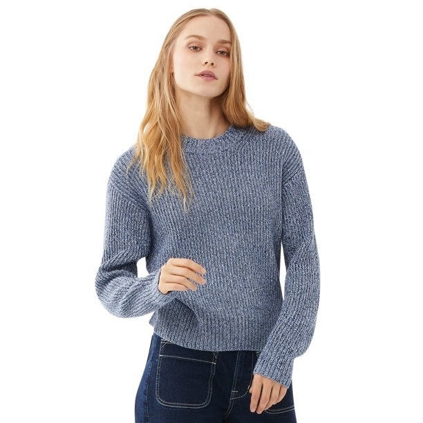 Model in blue chunky crewneck sweater