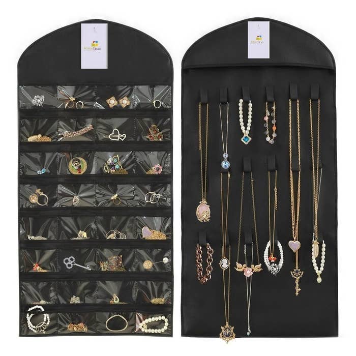 Earring and bracelets kept in the transparent pockets of the organiser. Neckpieces are hung up on the loops of the organiser.