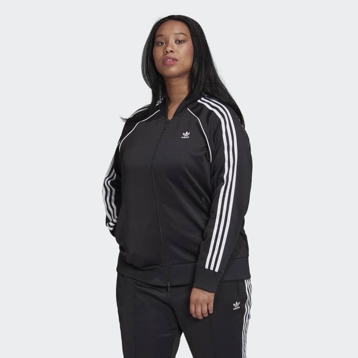 Model wearing black and white style of jacket